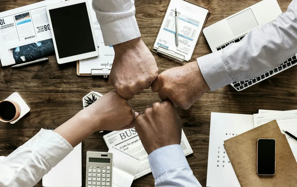 Business team discussing regular computer maintenance strategy